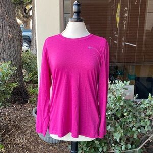Nike- dry fit- woman’s athletic top. Size XL, in magenta